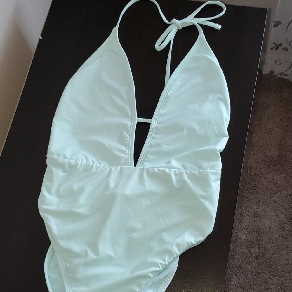 One-piece swimsuit w/ ruched bottom